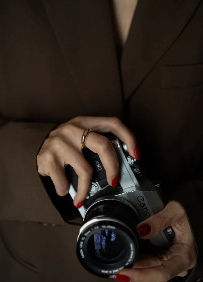 Photographer with golden ring